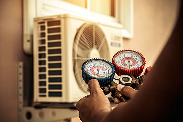 Professional Heat Pump Repair technician working in Rosston, TX